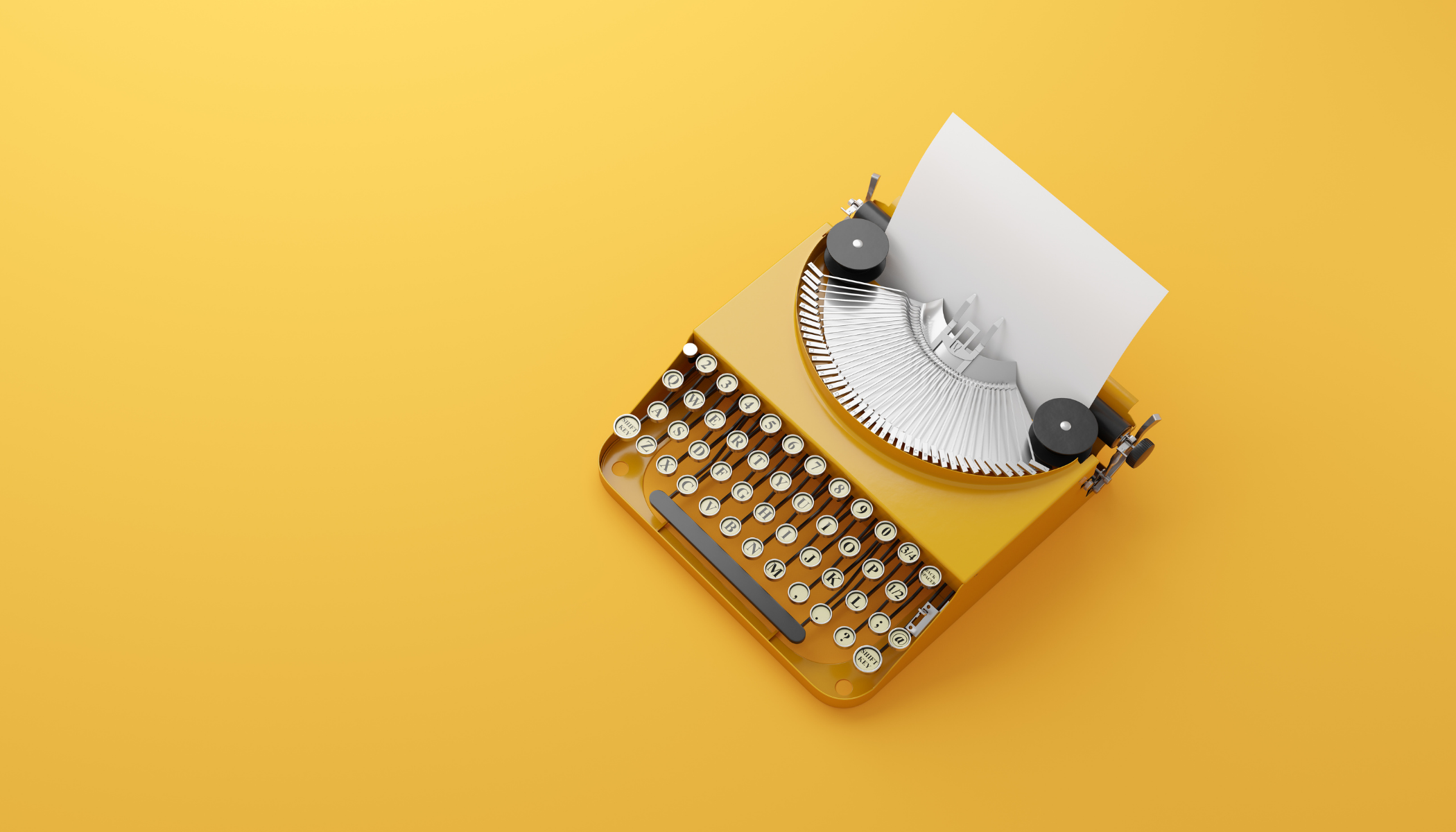 Vintage yellow typing machine on yellow background